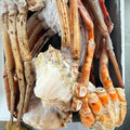 CLEANED ORANGE CRAB SECTIONS WITH  CLAWS 1KG - PRE COOKED/BLANCHED