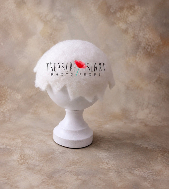 Matching felted eggshell bonnet for newborn photography styling
