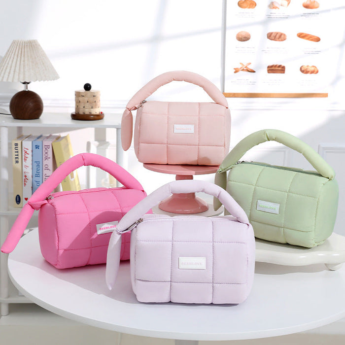 Puffer Travel Pouch in pastel colors with quilted soft design for organized storage