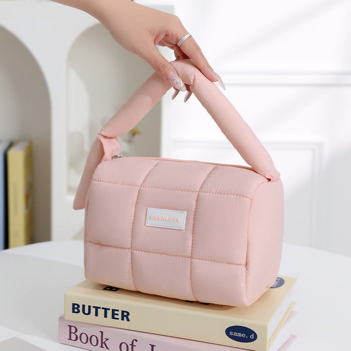 Puffer Travel Pouch in pastel colors for organizing essentials during travel and everyday use