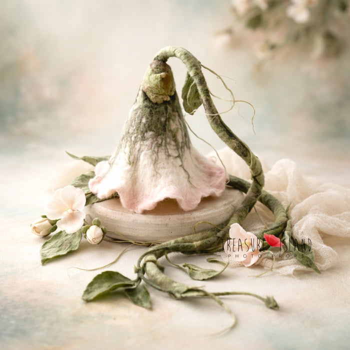 Handmade felted bonnet with delicate floral details in organic pastel colors- photo props